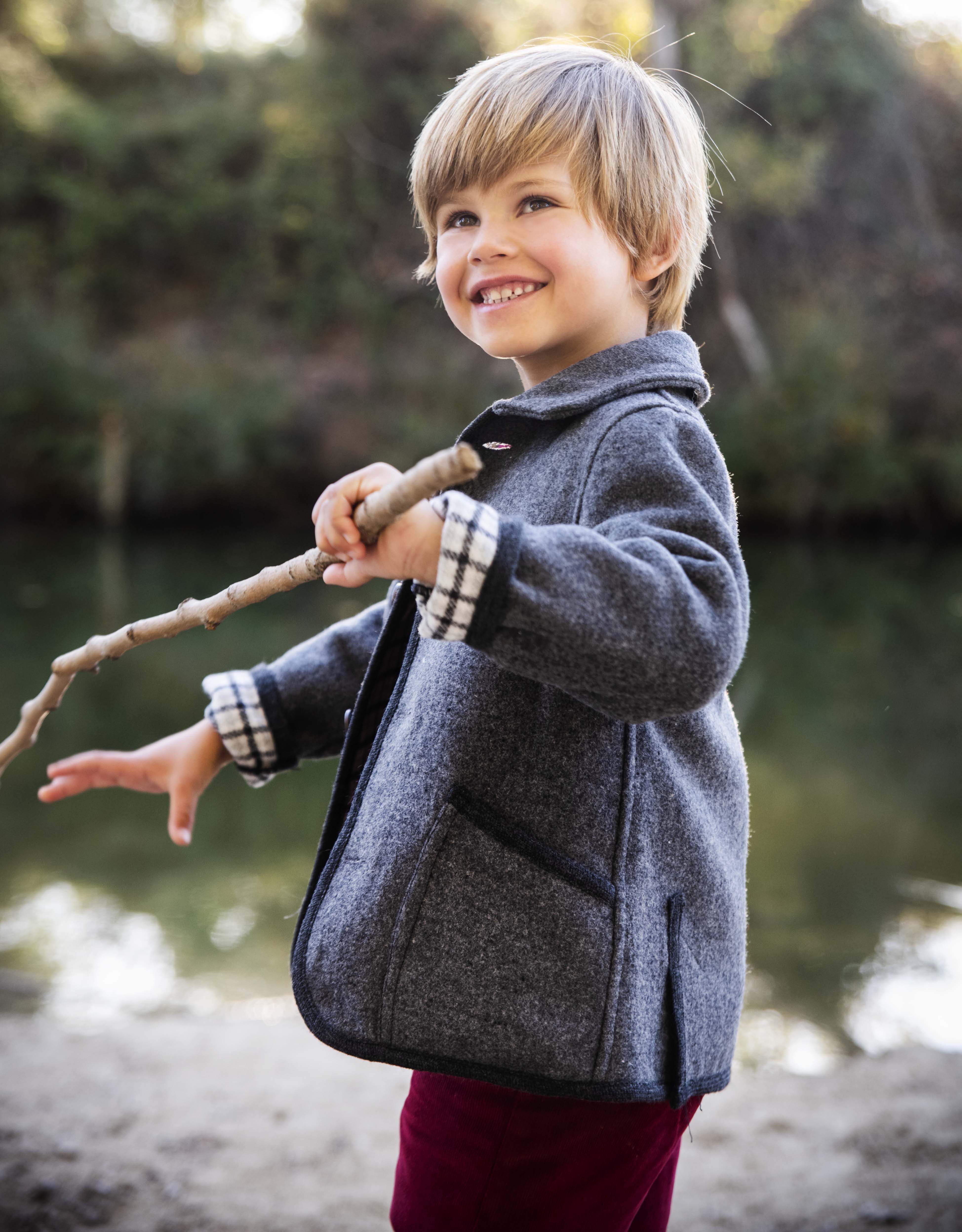 grey coat austrian boy