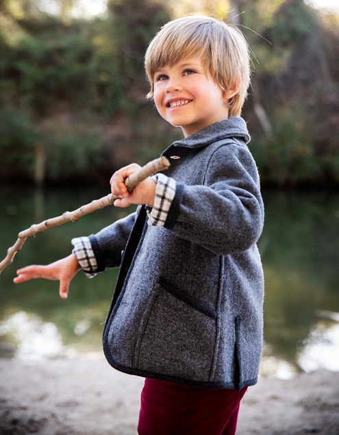 grey coat austrian boy