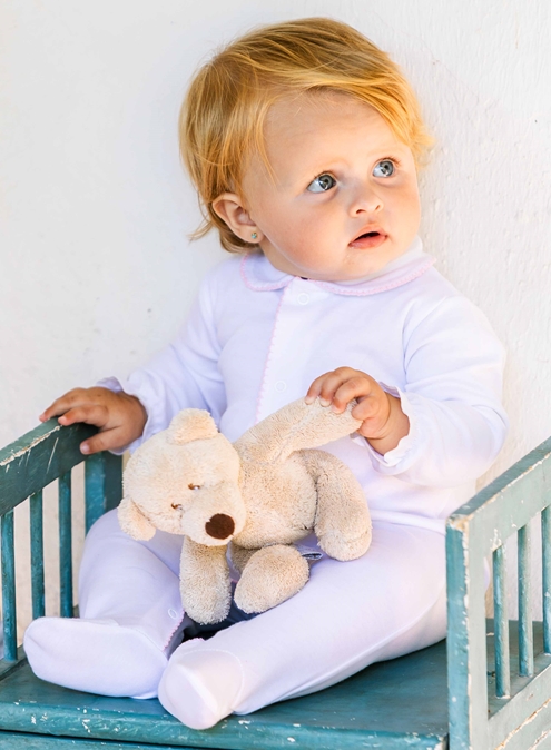 Long white sleepsuit with pink pattern